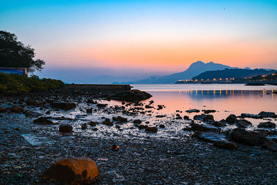 Scenic view of sea against sky during sunset