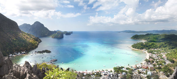 Panoramic view of bay against sky