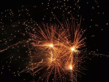 Low angle view of sky illumed with fire crackers