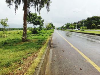 Road passing through field