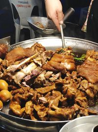 Close-up of person preparing food