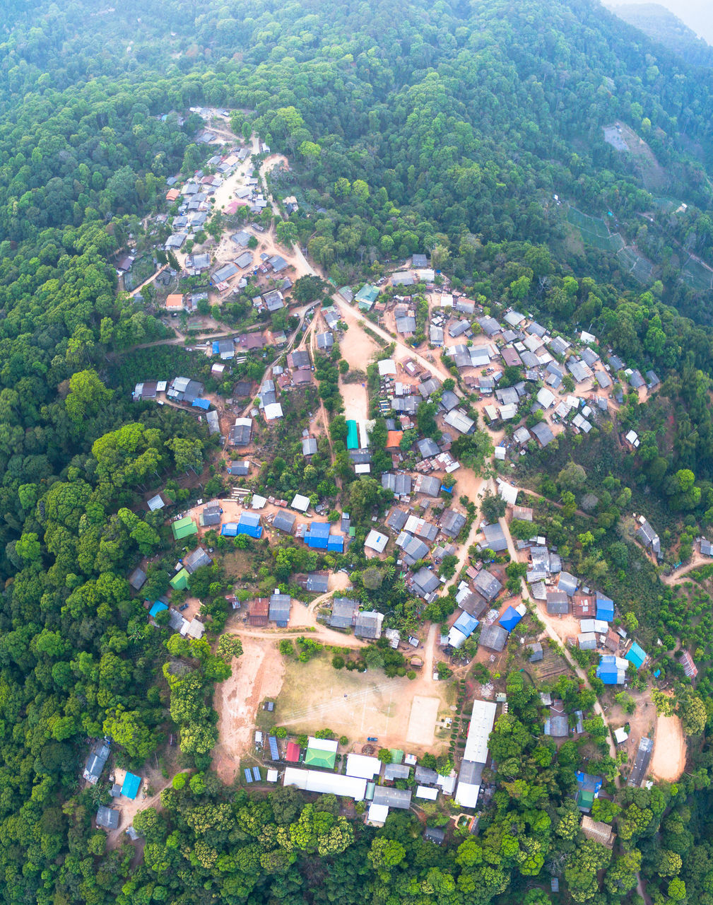 HIGH ANGLE VIEW OF HOUSES IN TOWN