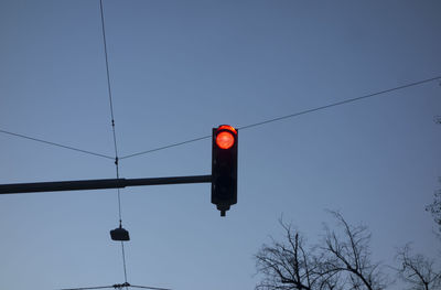 Red traffic light signal on the street, symbol for stopping