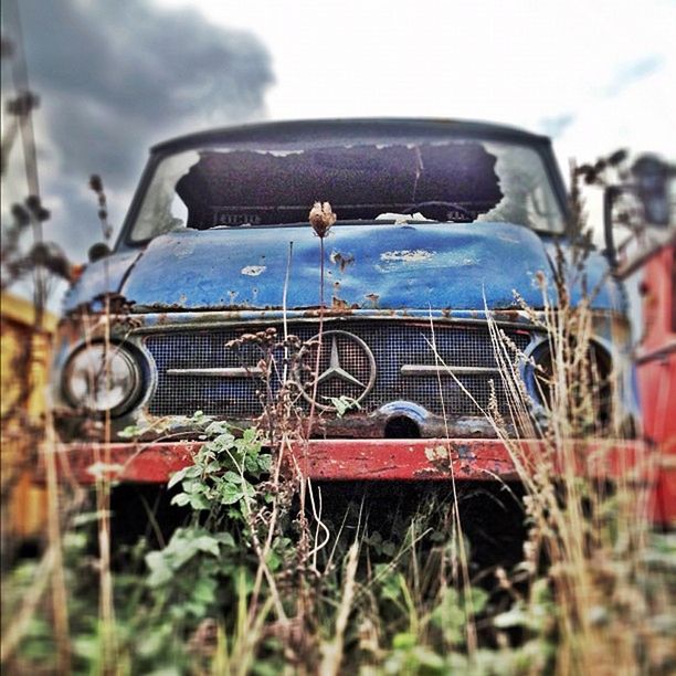 abandoned, obsolete, transportation, mode of transport, damaged, field, rusty, run-down, deterioration, old, land vehicle, nautical vessel, close-up, car, grass, boat, sky, day, no people, focus on foreground