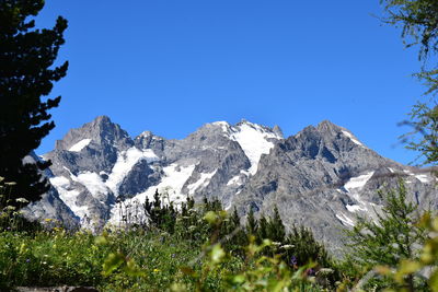 Scenic view of mountains against clear sky