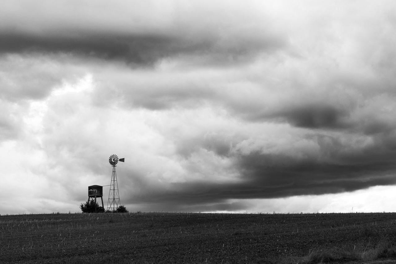 cloud - sky, sky, field, land, nature, environment, no people, beauty in nature, day, scenics - nature, overcast, storm, outdoors, landscape, horizon over land, horizon, tranquil scene, non-urban scene, storm cloud