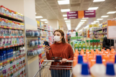 Woman wearing mask at store