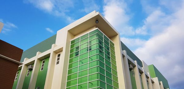 Low angle view of modern building against sky