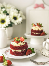 Close-up of strawberries cake  in plate on table