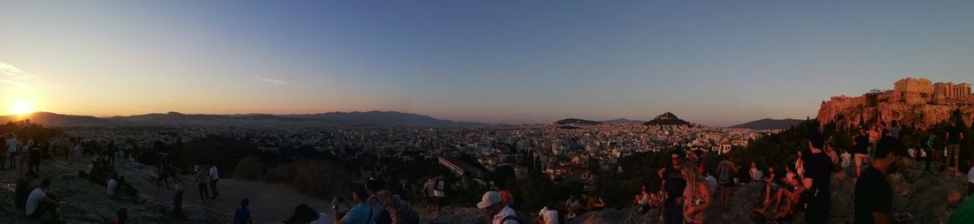 Panoramic view of crowd at sunset