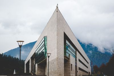 Low angle view of modern building against sky