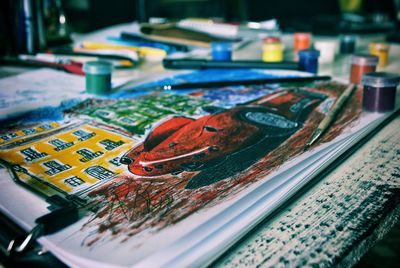 High angle view of paintbrushes on table