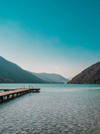 Scenic view of lake against blue sky