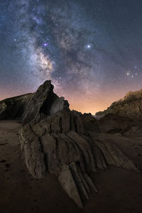 Scenic view of rock formation against sky