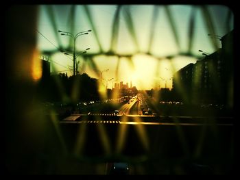 Defocused image of illuminated city at night