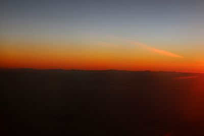 Scenic view of silhouette landscape against sky during sunset