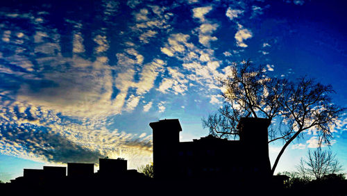 Low angle view of building against blue sky