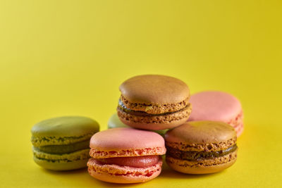 Close-up of dessert against yellow background