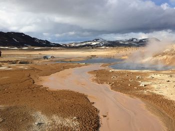 Scenic view of volcanic landscape against sky