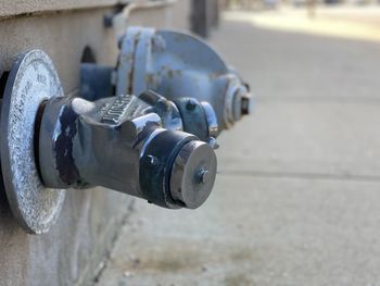 Close-up of fire hydrant on wall