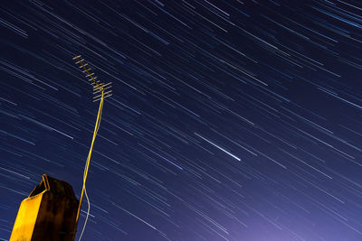 Low angle view of star field against sky at night