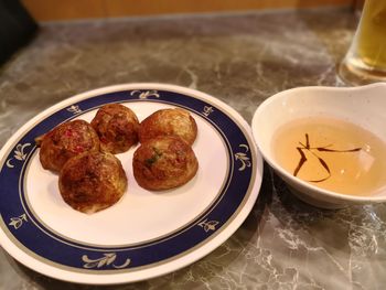 Close-up of food in plate on table