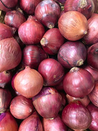 Full frame shot of onions for sale at market stall