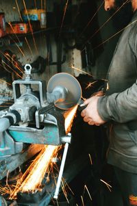 Close-up mid section of welder at work