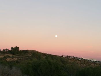 Scenic view of sea against sky at sunset