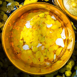 High angle view of lemon in glass bowl