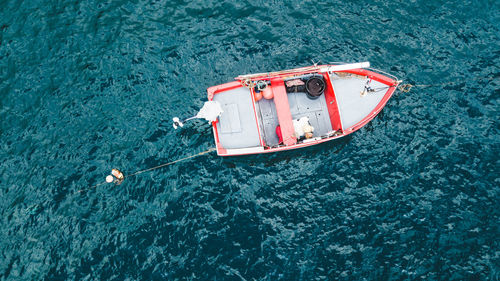 High angle view of boat sailing in sea