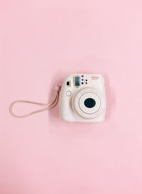 Close-up of pink camera