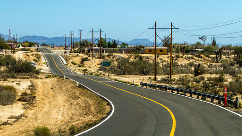 High angle view of railroad tracks against clear sky