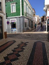 Cobblestone street in city