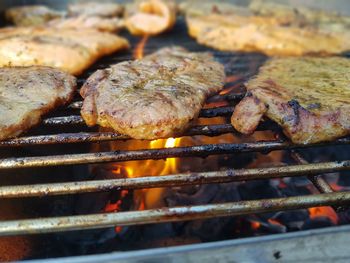 Close-up of meat on barbecue grill