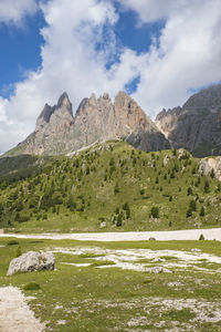 View to mountain peaks from an a alp valley