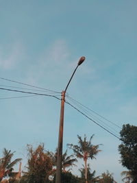 Low angle view of street light against sky