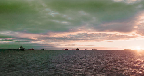 Scenic view of sea against sky during sunset