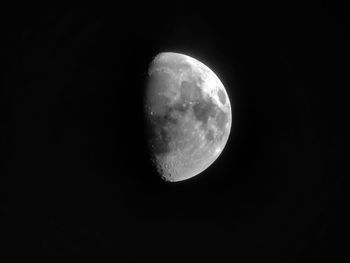 Low angle view of moon against clear sky at night