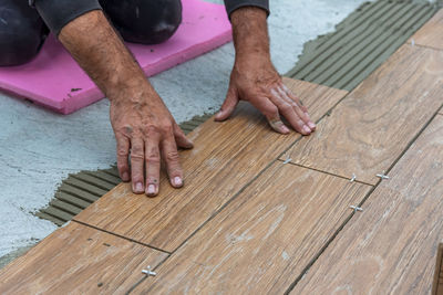 High angle view of man working on wood