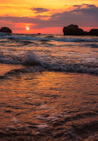 Scenic view of sea against sky during sunset