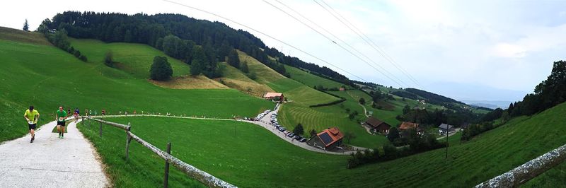 People looking at mountain landscape