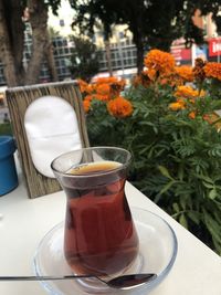 Close-up of tea in glass on table