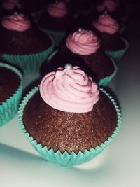 Close-up of cupcakes on cake