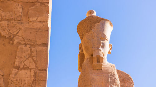 Low angle view of statue against clear sky