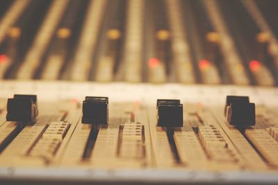 Close-up of sound mixer in recording studio