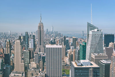 Modern buildings in city against sky