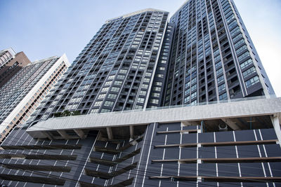 Low angle view of modern buildings against clear sky