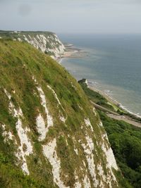 Scenic view of sea and cliff