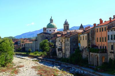 View of buildings against blue sky